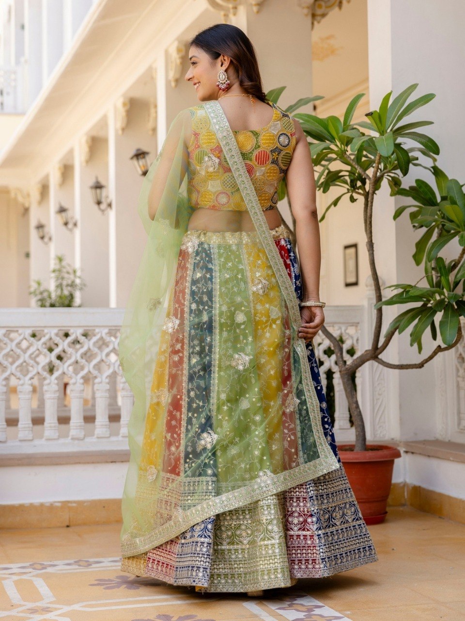 Grand Faux Georgette Designer Multicolor Lehenga Set with Net Dupatta