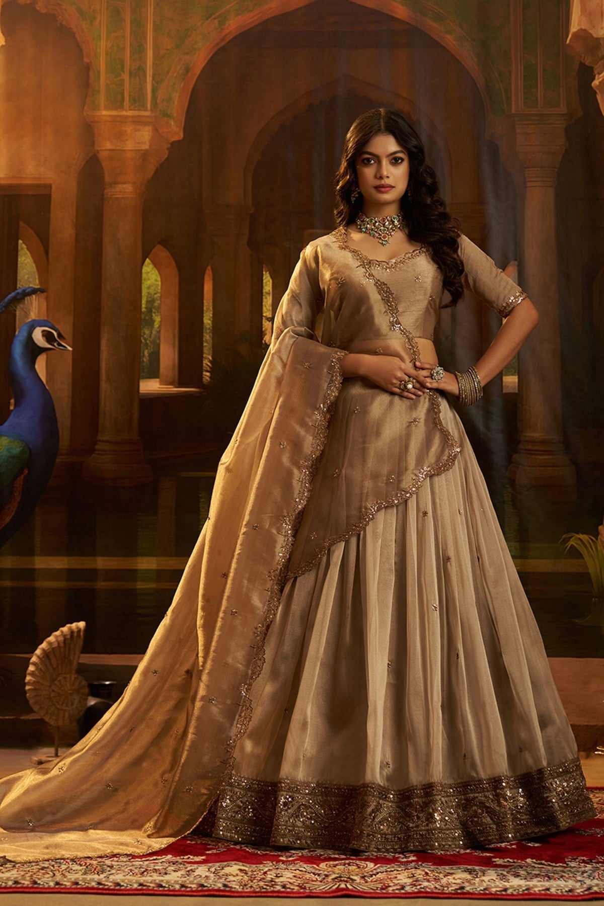 Luxury Brown Hiranya Silk Lehenga Set Featuring Art Silk Blouse And Detailed Embroidered Dupatta