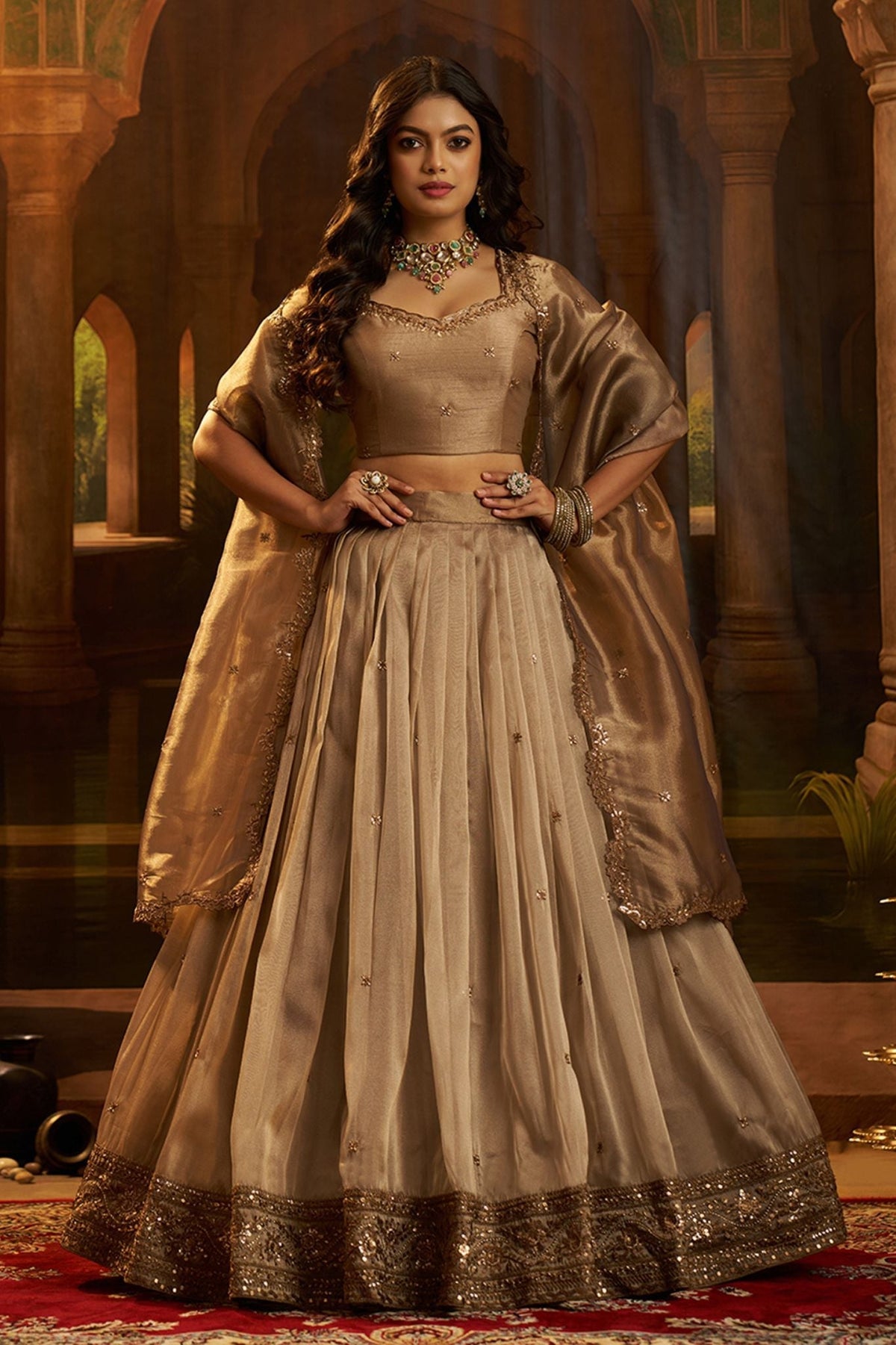 Luxury Brown Hiranya Silk Lehenga Set Featuring Art Silk Blouse And Detailed Embroidered Dupatta