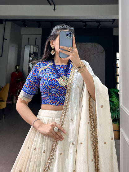 Glamorous Off White Vichitra Silk Sequins Embroidered Work Lehenga Choli Set